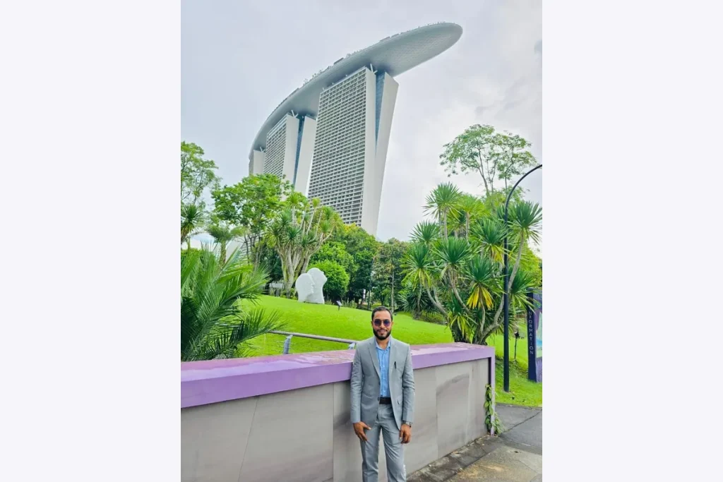 Dr. Shaikh Salman Salam with Marina Bay Sands in the background.