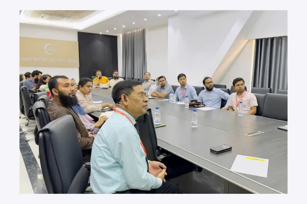 Attendees seated in a medical seminar lecture room